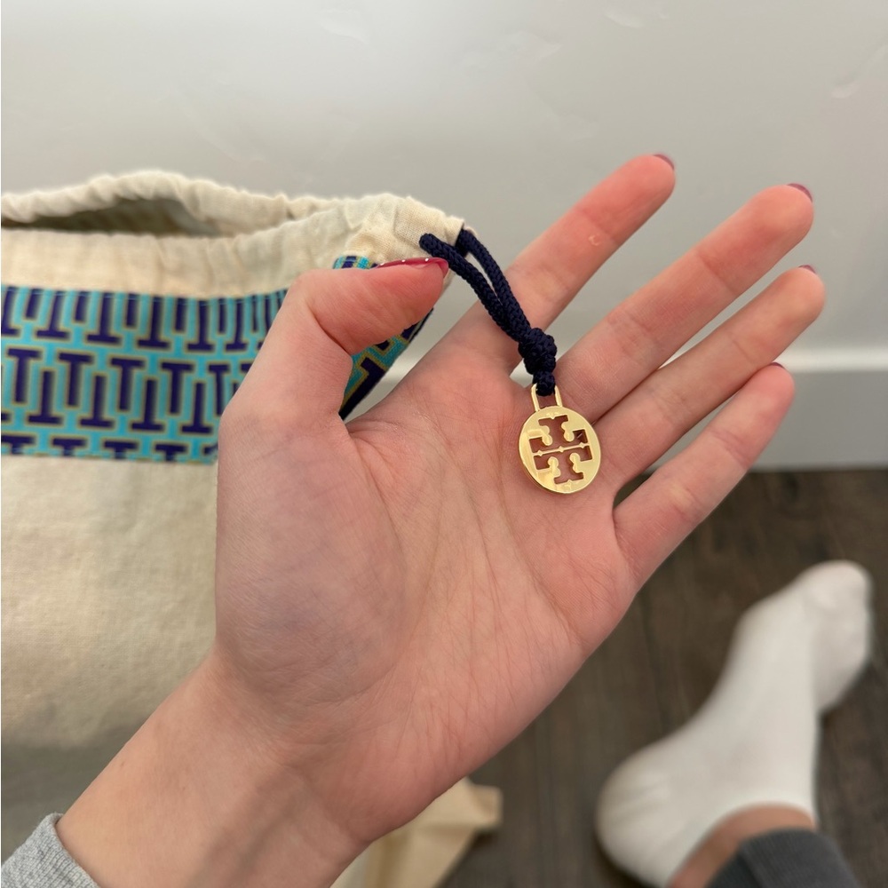 Tory Burch Monogram Drawstring Tote - Picture 14 of 16